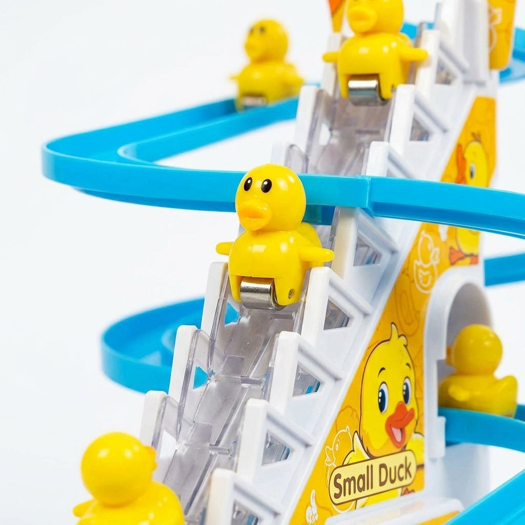 Close-up detail of rolling duck figures and motorized staircase steps